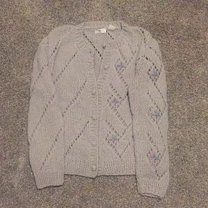 Grey knitted sweater with purple flowers